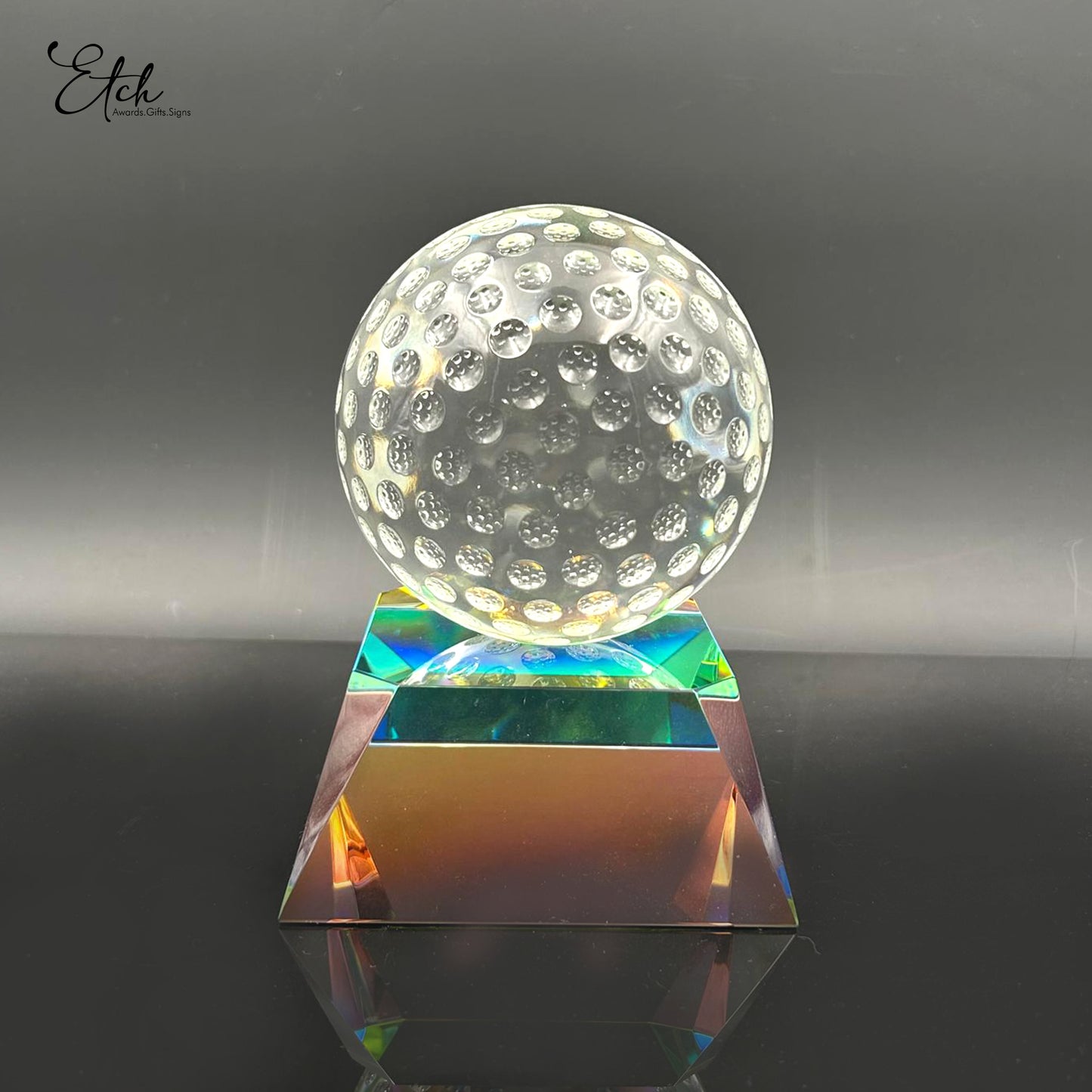 Clear Golf Ball on Radiant Base
