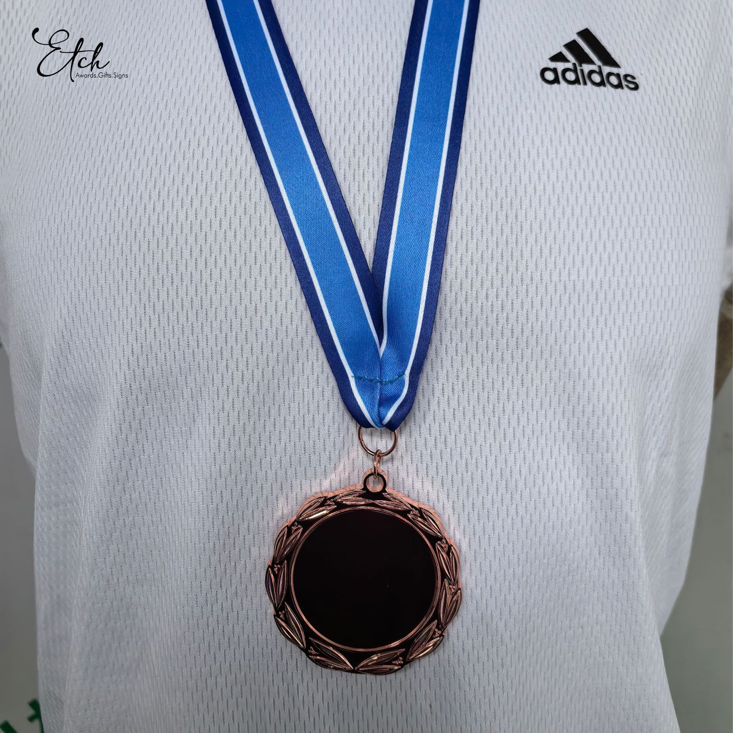 Etch Medal